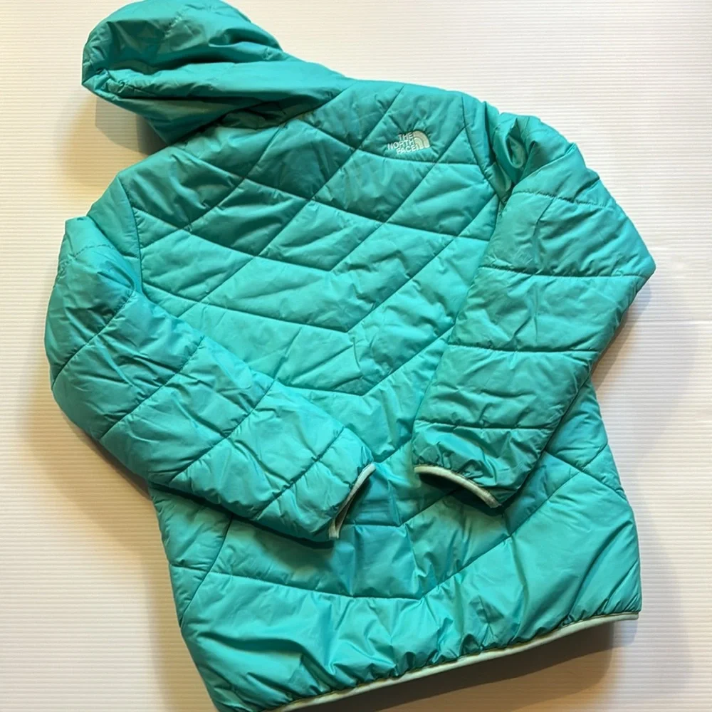 The North Face reversible puffers jacket.  Green, yellow, white swirl. Girls XL